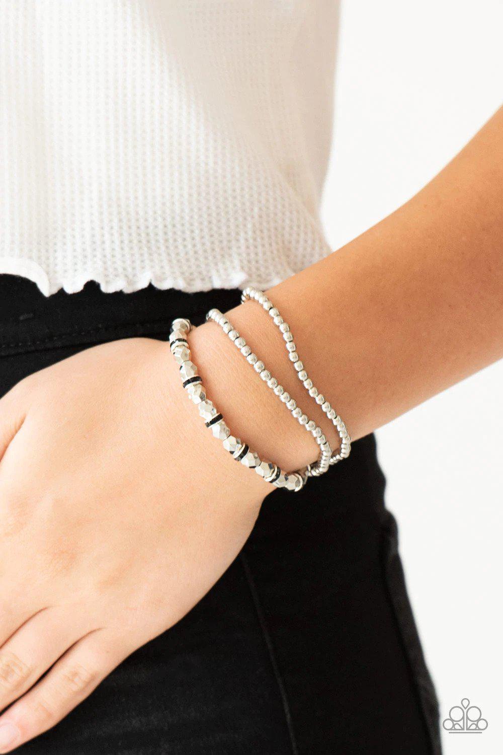 Let There BEAM Light Black Bracelet - Paparazzi Accessories- on model - CarasShop.com - Paparazzi Jewelry by Cara Jewels