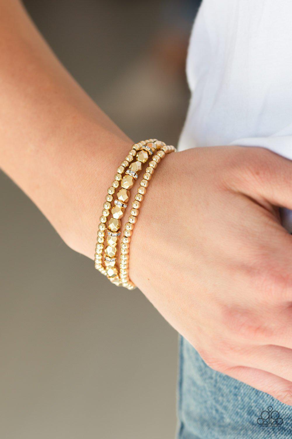 Let There BEAM Light Gold Stretch Bracelet Set - Paparazzi Accessories- lightbox - CarasShop.com - Paparazzi Jewelry by Cara Jewels