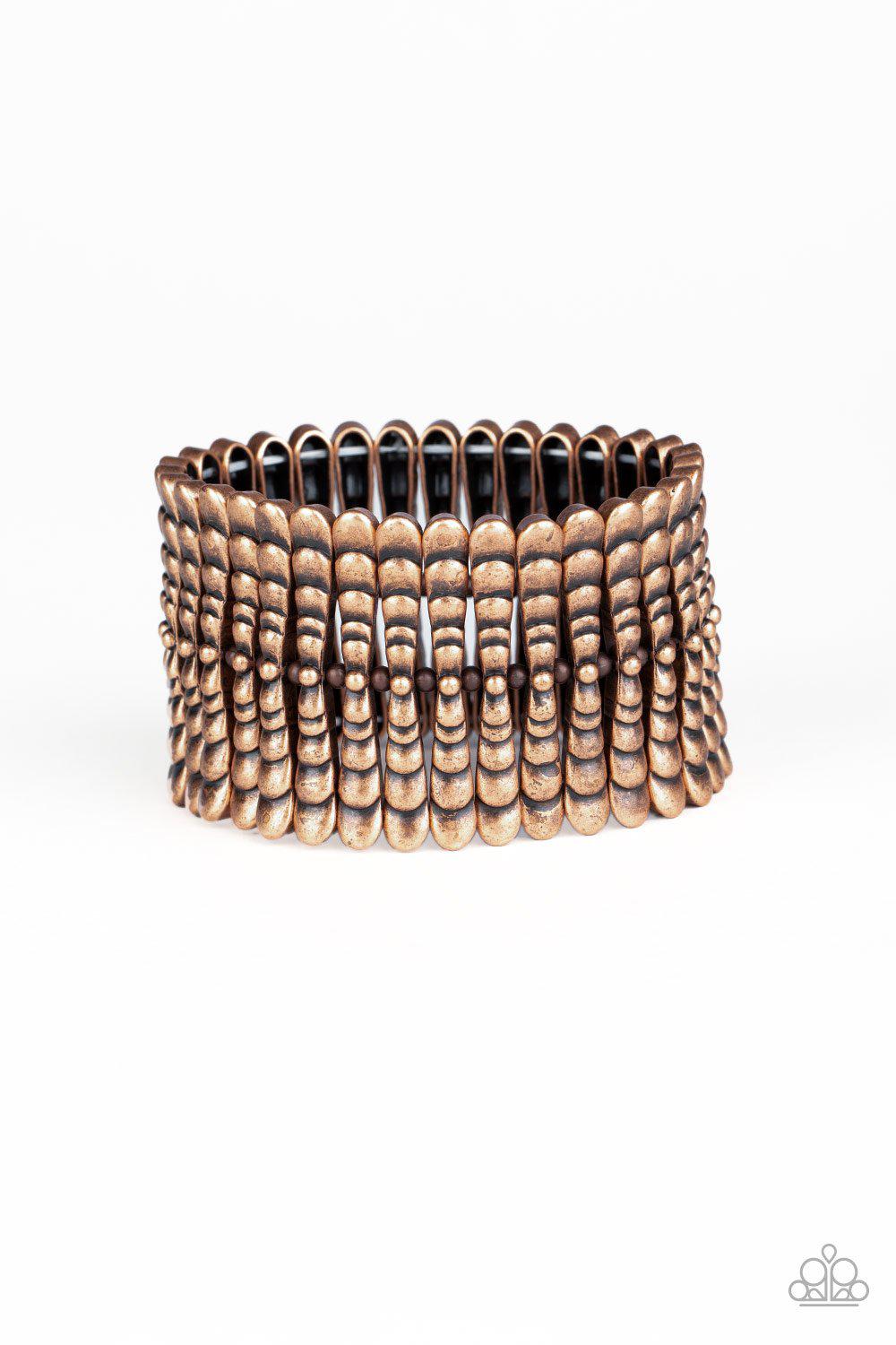 Level The Field Copper Stretch Bracelet - Paparazzi Accessories- on model - CarasShop.com - Paparazzi Jewelry by Cara Jewels