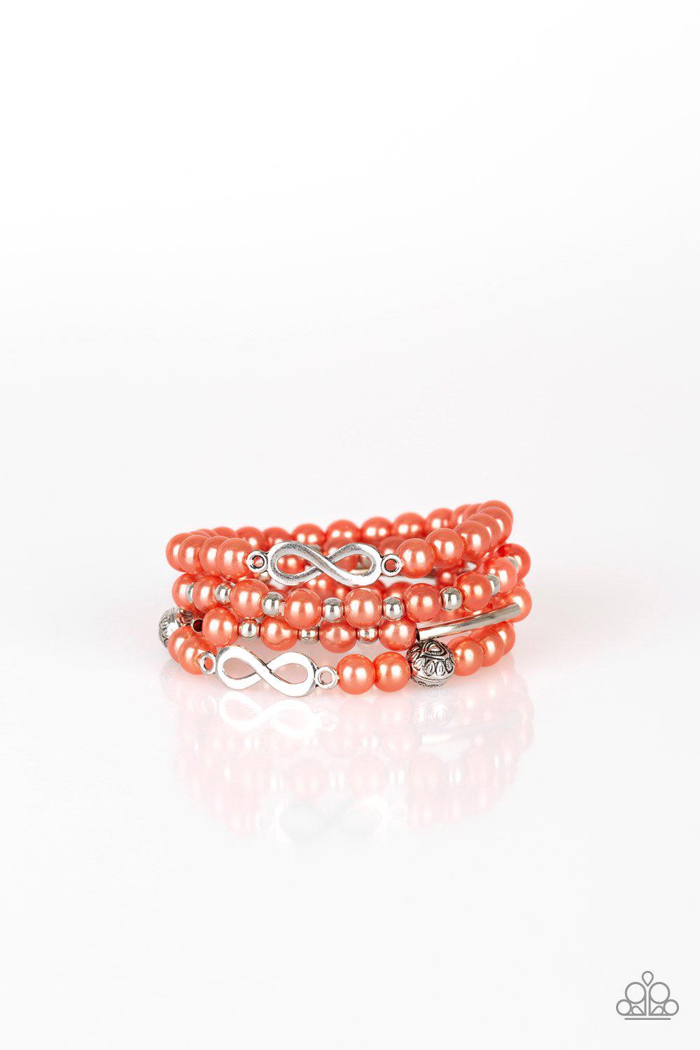 Limitless Luxury Coral Bracelet Set - Paparazzi Accessories- on model - CarasShop.com - Paparazzi Jewelry by Cara Jewels