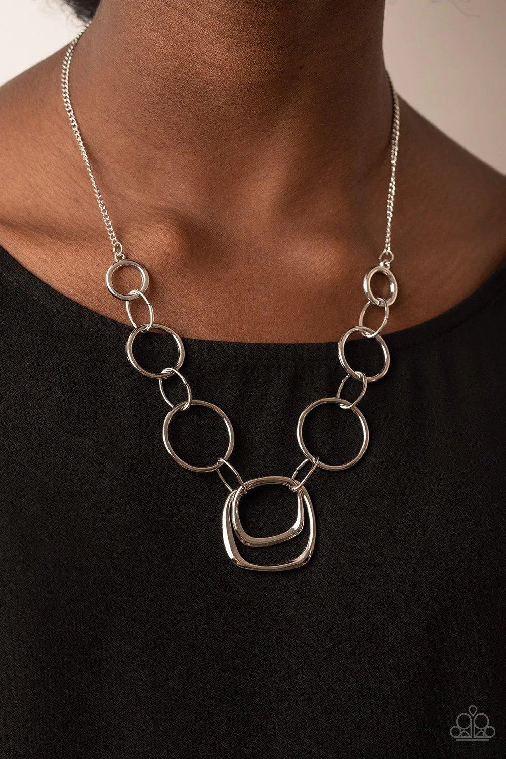 Linked Up Luminosity Silver Necklace - Paparazzi Accessories- on model - CarasShop.com - Paparazzi Jewelry by Cara Jewels