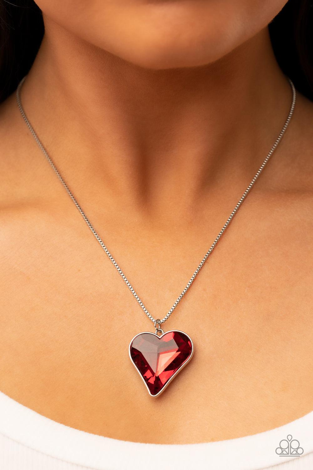 Lockdown My Heart Red Rhinestone Heart Necklace - Paparazzi Accessories- on model - CarasShop.com - Paparazzi Jewelry by Cara Jewels