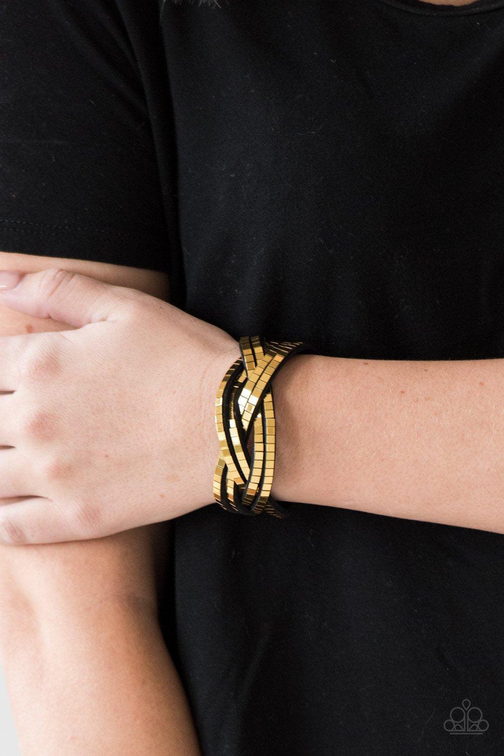 Looking For Trouble Gold and Black Suede Urban Wrap Snap Bracelet - Paparazzi Accessories- on model - CarasShop.com - Paparazzi Jewelry by Cara Jewels