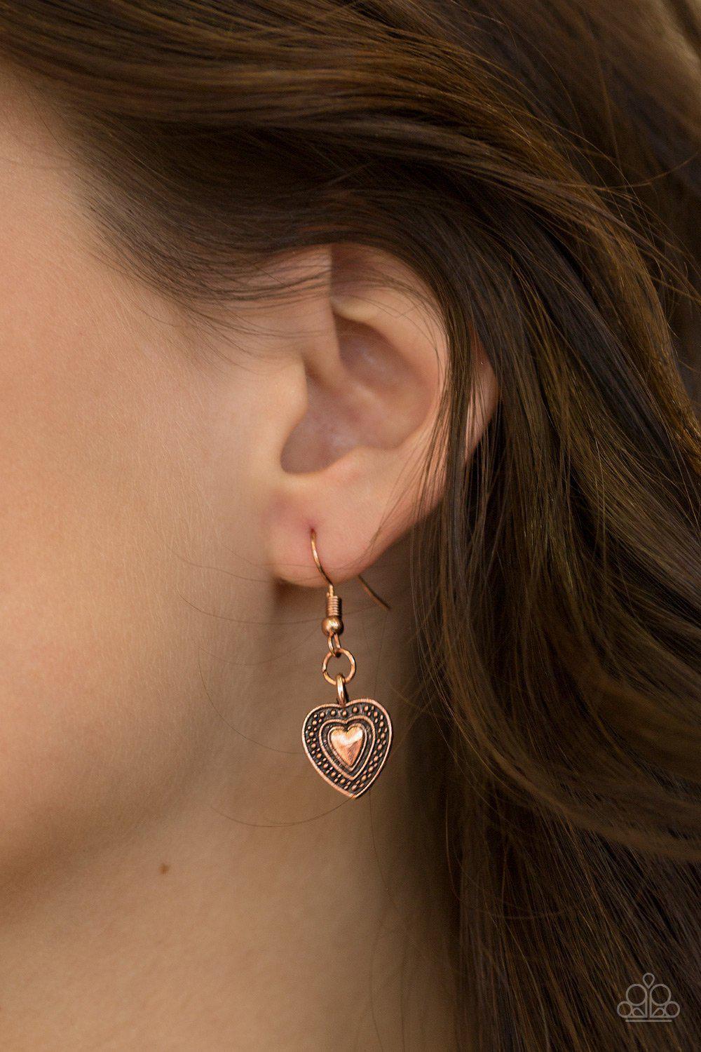Lost In The Moment Copper Heart Necklace - Paparazzi Accessories- on model - CarasShop.com - Paparazzi Jewelry by Cara Jewels