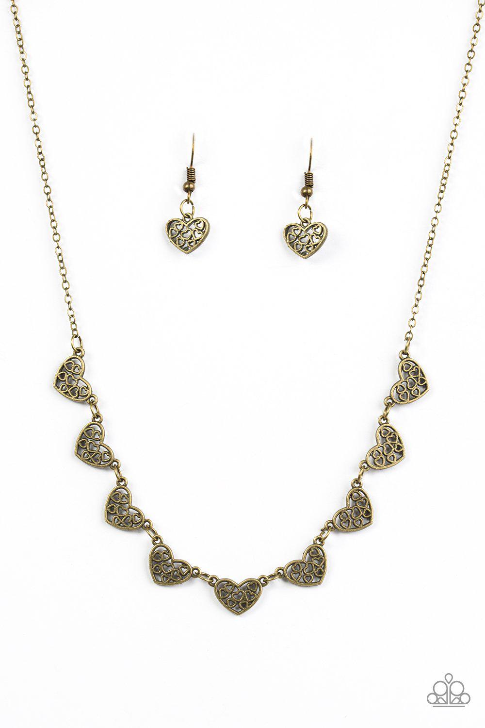Love And Devotion Brass Heart Necklace - Paparazzi Accessories - free matching earrings -CarasShop.com - Paparazzi Jewelry by Cara Jewels