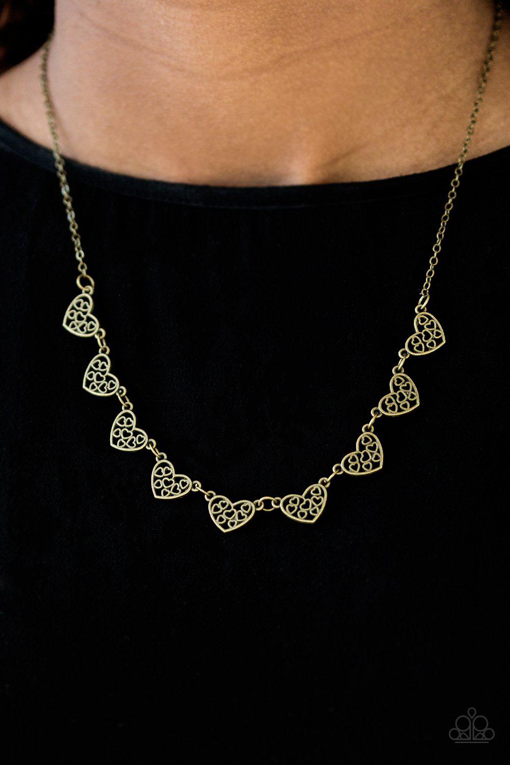 Love And Devotion Brass Heart Necklace - Paparazzi Accessories- lightbox - CarasShop.com - Paparazzi Jewelry by Cara Jewels