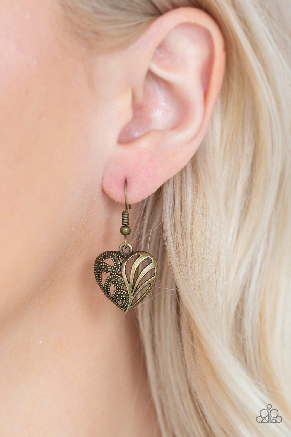 Love Lockets Brass Heart Necklace and matching Earrings - Paparazzi Accessories- on model - CarasShop.com - Paparazzi Jewelry by Cara Jewels