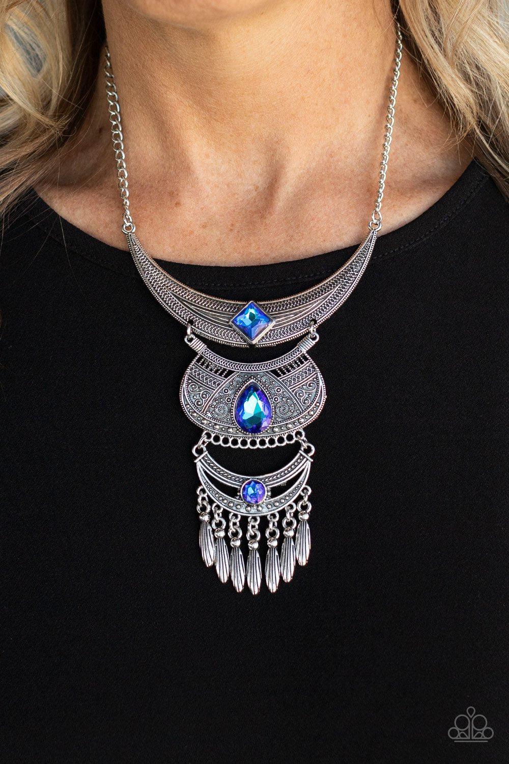 Lunar Enchantment Blue UV Shimmer Rhinestone Necklace - Paparazzi Accessories- on model - CarasShop.com - Paparazzi Jewelry by Cara Jewels