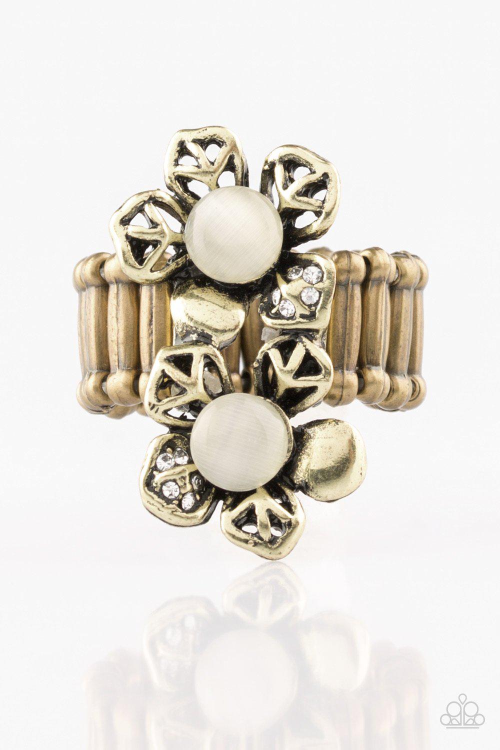 Magnolia Mansions Brass and White Moonstone Flower Ring - Paparazzi Accessories- on model - CarasShop.com - Paparazzi Jewelry by Cara Jewels