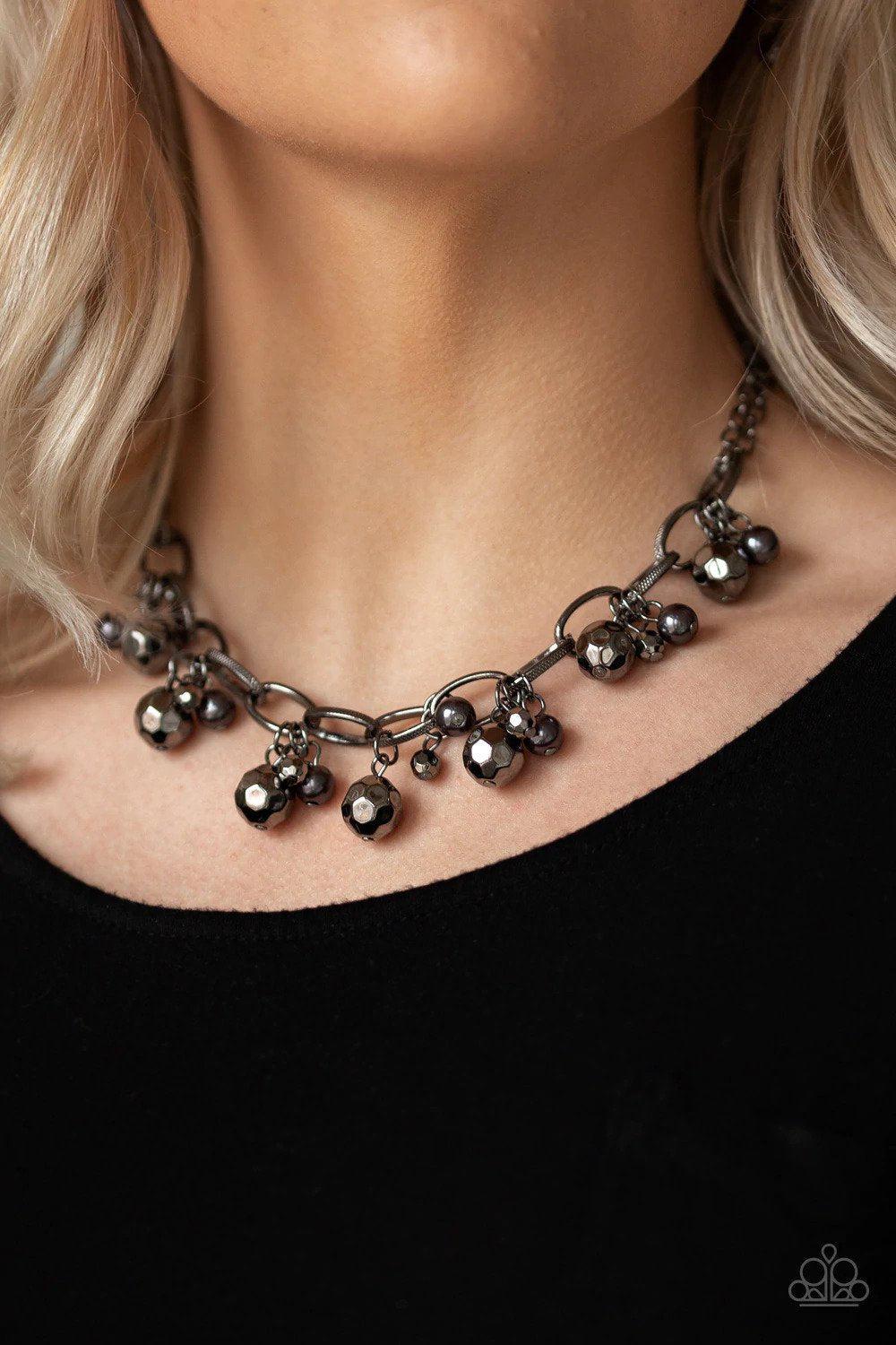 Malibu Movement Gunmetal Black Necklace - Paparazzi Accessories- on model - CarasShop.com - Paparazzi Jewelry by Cara Jewels