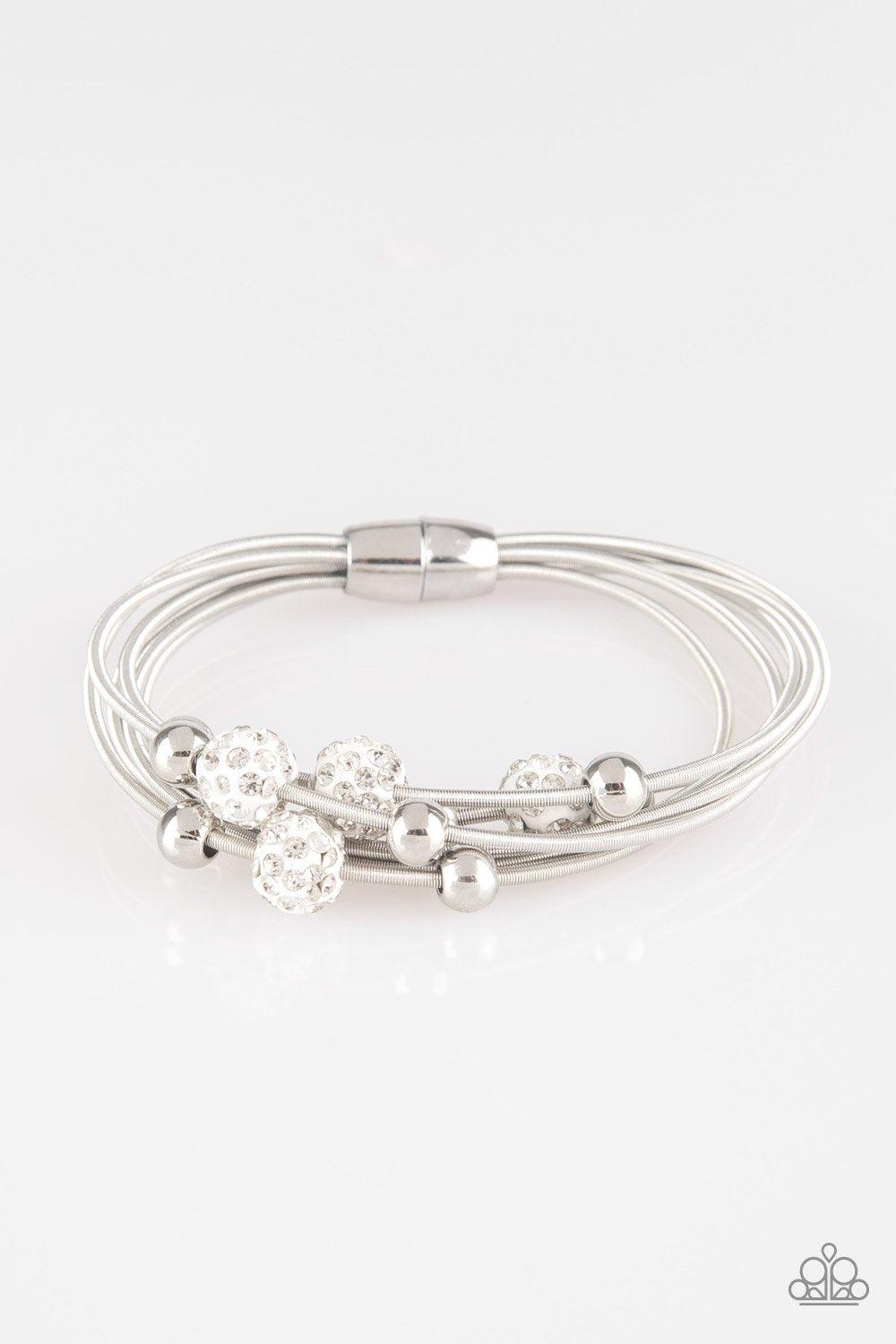 Marvelously Magnetic White and Silver Bracelet - Paparazzi Accessories- on model - CarasShop.com - Paparazzi Jewelry by Cara Jewels