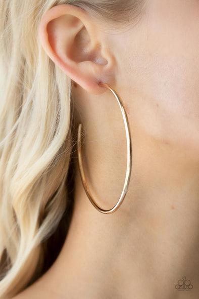 Mega Metro Gold Hoop Earrings - Paparazzi Accessories- on model - CarasShop.com - Paparazzi Jewelry by Cara Jewels