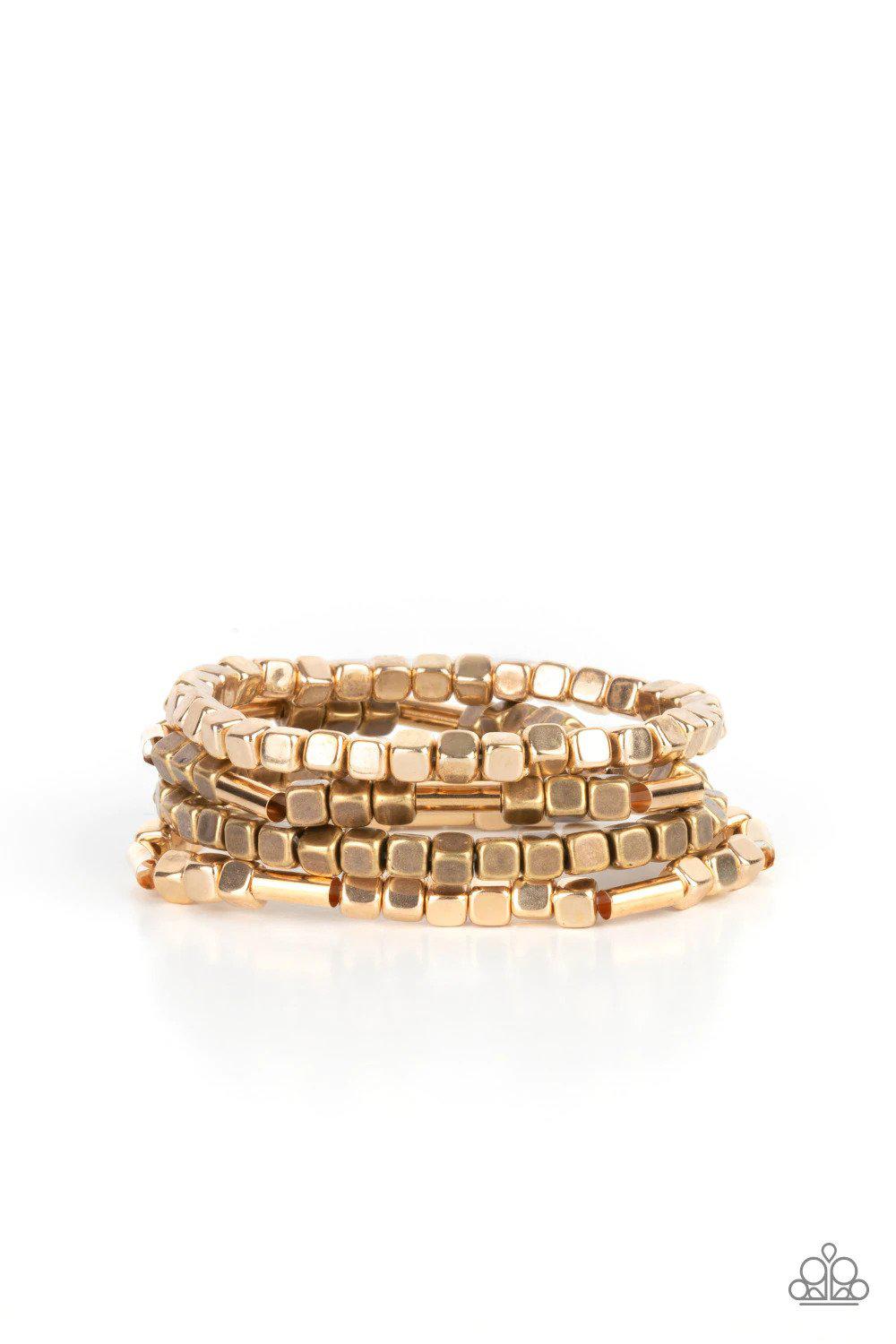 Metro Materials Multi Gold and Brass Bracelet Set - Paparazzi Accessories- lightbox - CarasShop.com - Paparazzi Jewelry by Cara Jewels