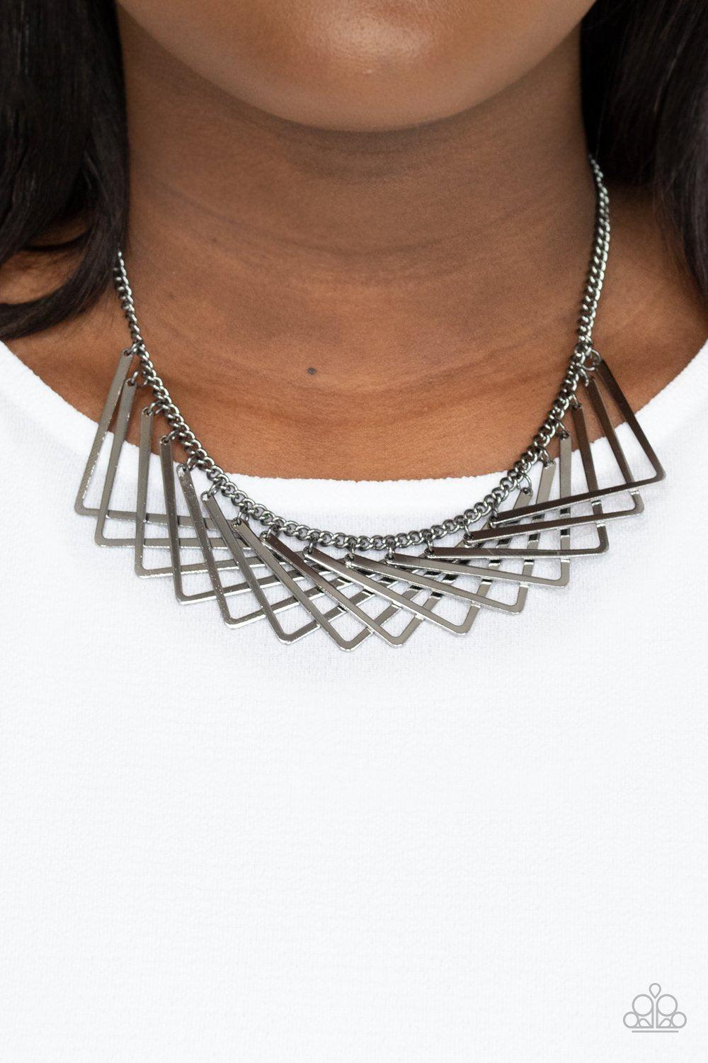 Metro Mirage Gunmetal Black Necklace - Paparazzi Accessories- on model - CarasShop.com - Paparazzi Jewelry by Cara Jewels