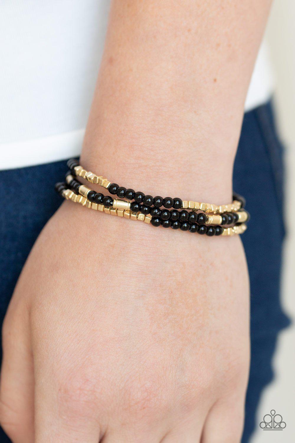 Micro Beading Black and Gold Bracelet Set- Paparazzi Accessories- on model - CarasShop.com - Paparazzi Jewelry by Cara Jewels
