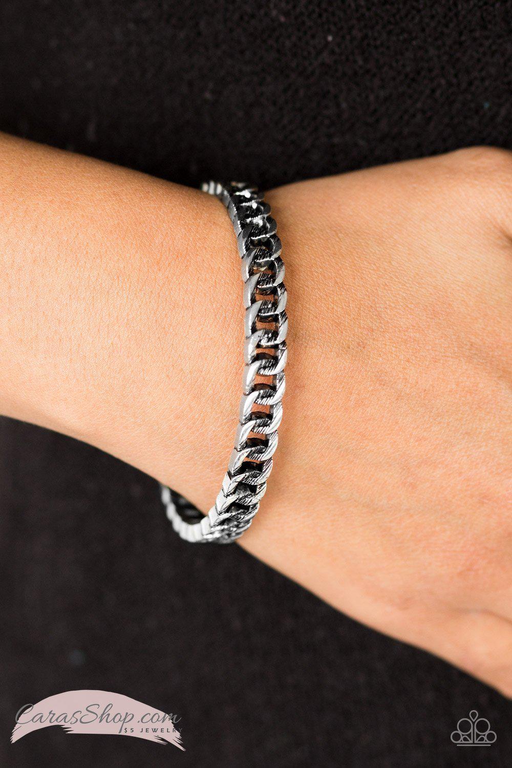 Might and CHAIN - Silver Bangle Bracelet - Paparazzi Accessories- on model - CarasShop.com - Paparazzi Jewelry by Cara Jewels