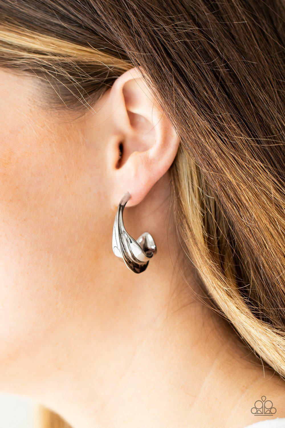 Modern Meltdown Silver Hoop Earrings - Paparazzi Accessories- on model - CarasShop.com - Paparazzi Jewelry by Cara Jewels