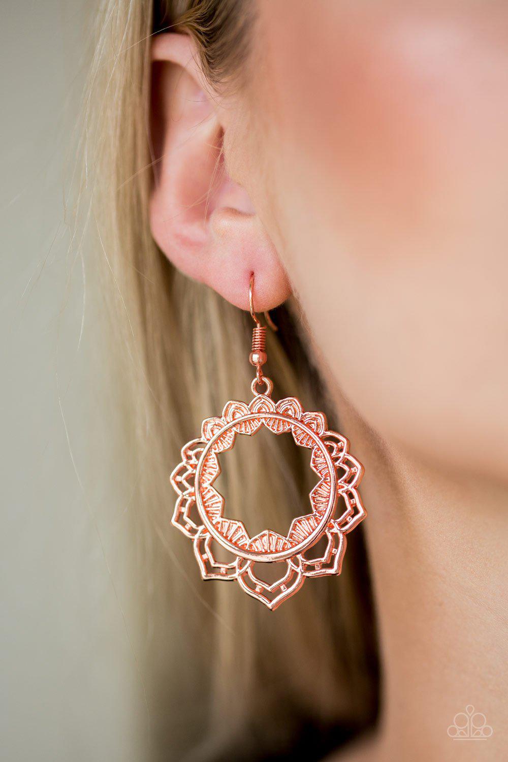 Modest Mandalas Shiny Copper Earrings - Paparazzi Accessories- on model - CarasShop.com - Paparazzi Jewelry by Cara Jewels