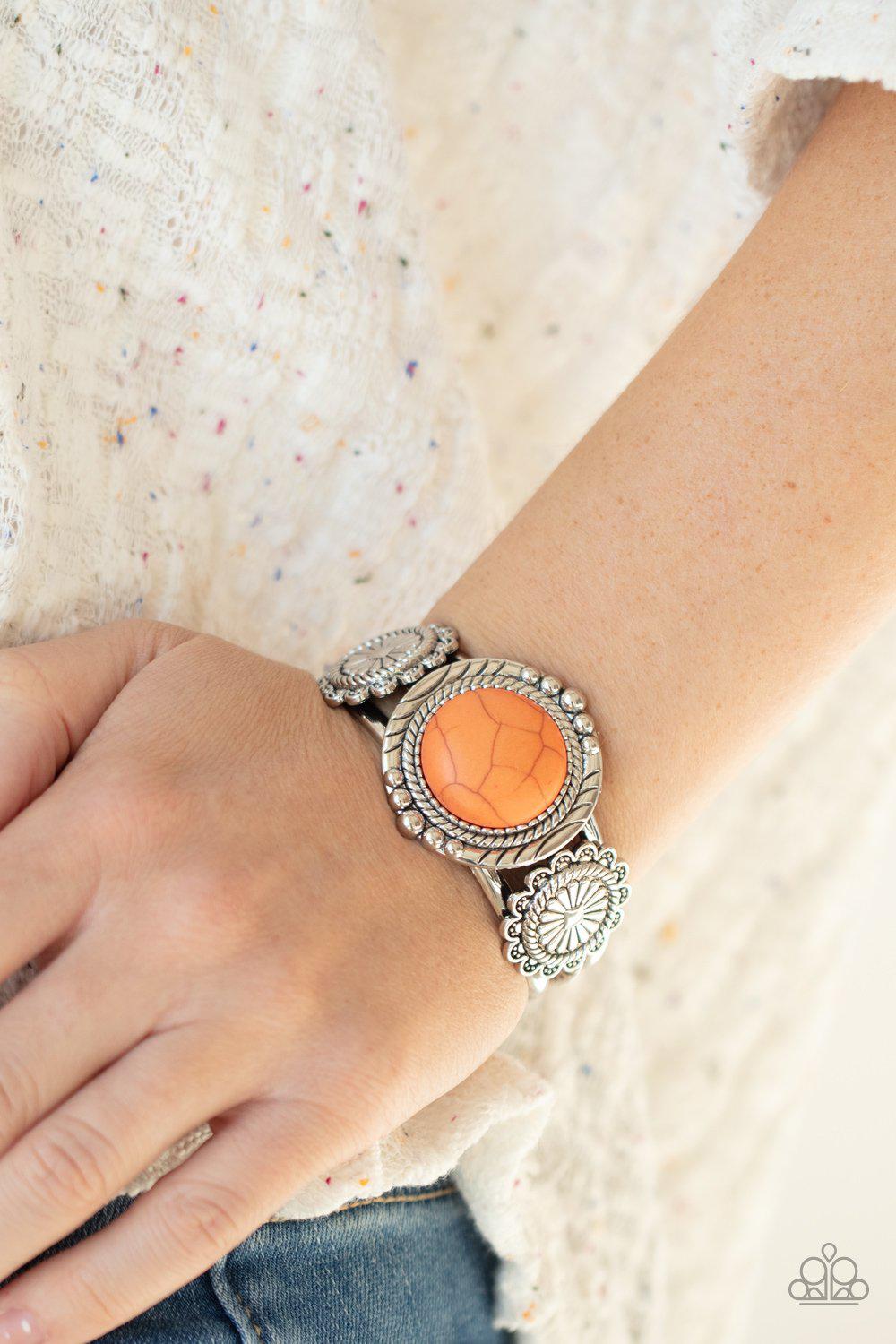 Mojave Motif Orange Stone Cuff Bracelet - Paparazzi Accessories- on model - CarasShop.com - Paparazzi Jewelry by Cara Jewels