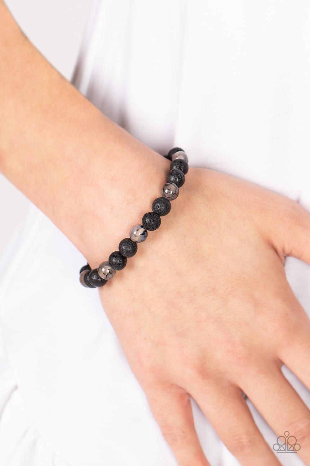 Molten Mogul Black Lava Rock Bracelet - Paparazzi Accessories- on model - CarasShop.com - Paparazzi Jewelry by Cara Jewels