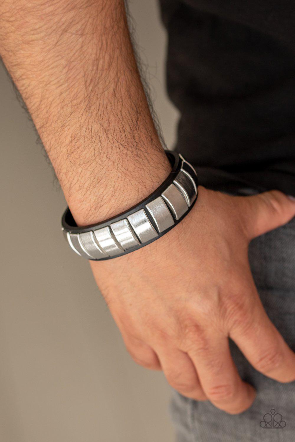 Moto Mode Silver and Black Leather Wrap Snap Bracelet - Paparazzi Accessories- on model - CarasShop.com - Paparazzi Jewelry by Cara Jewels