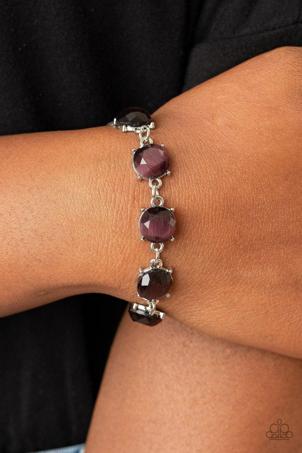 Ms. GLOW-It-All Purple Cat's Eye Bracelet - Paparazzi Accessories- on model - CarasShop.com - Paparazzi Jewelry by Cara Jewels