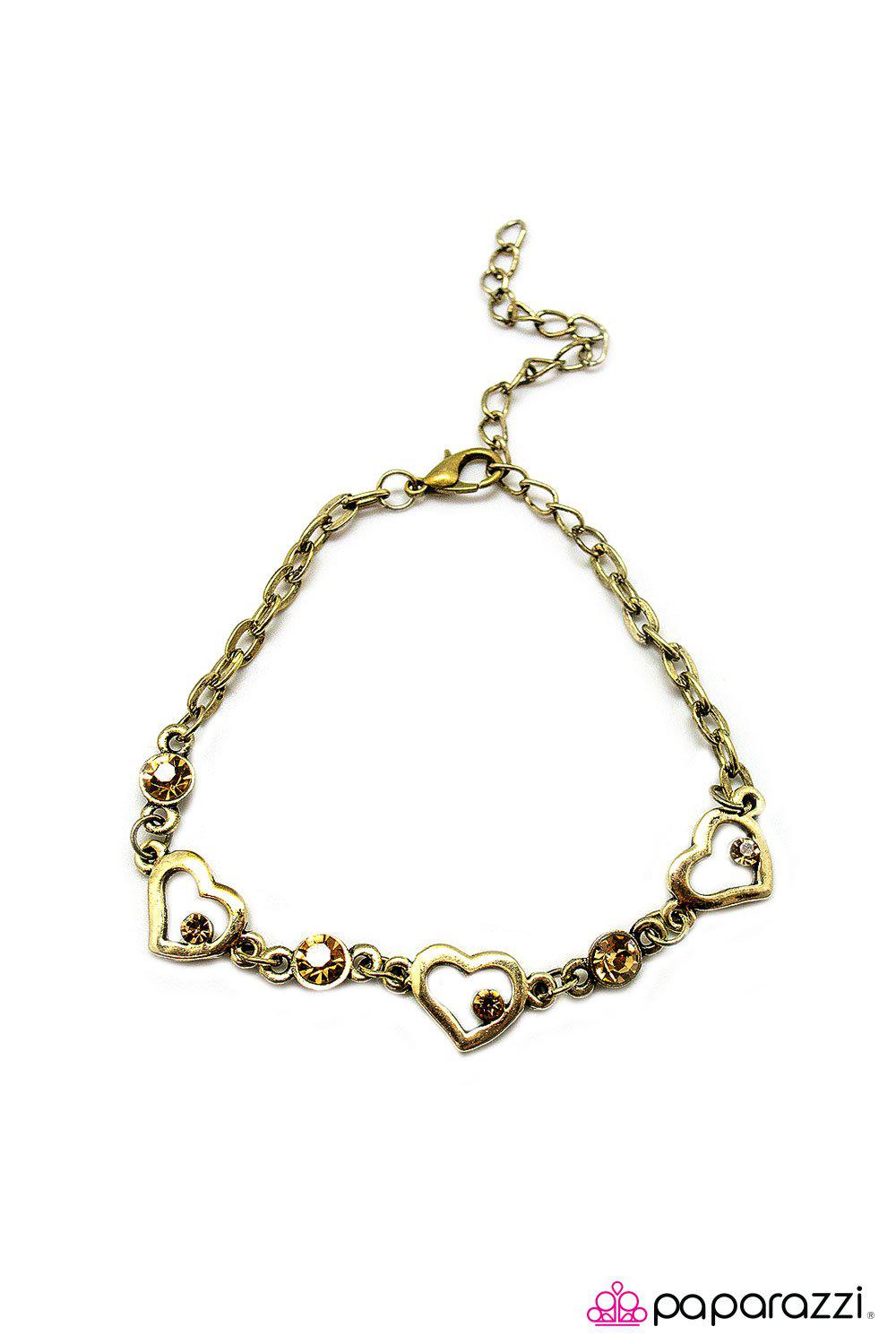 My Heart Will Go On Brass and Rhinestone Heart Bracelet - Paparazzi Accessories- on model - CarasShop.com - Paparazzi Jewelry by Cara Jewels