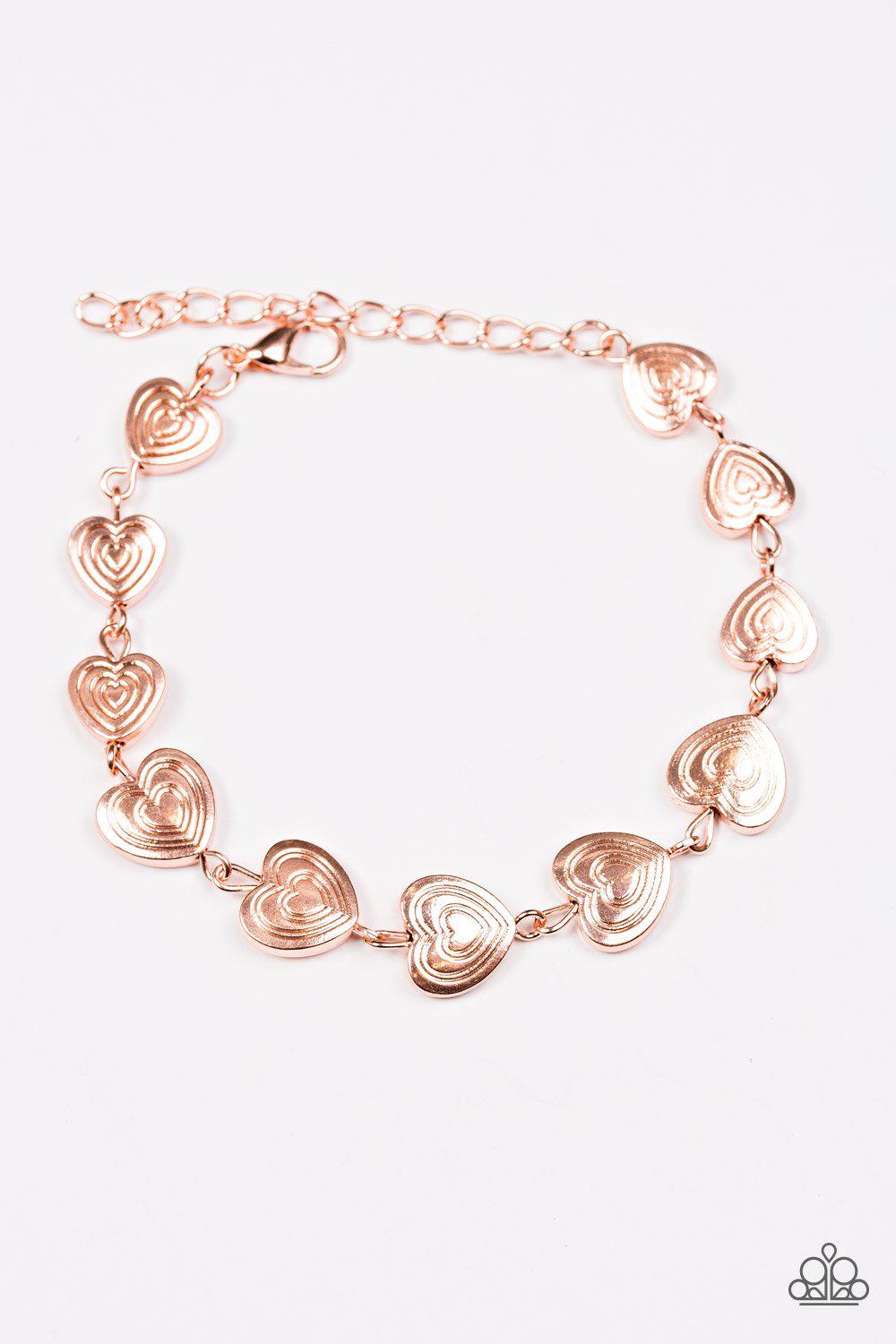 No Heart Feelings Copper Heart Bracelet - Paparazzi Accessories- on model - CarasShop.com - Paparazzi Jewelry by Cara Jewels