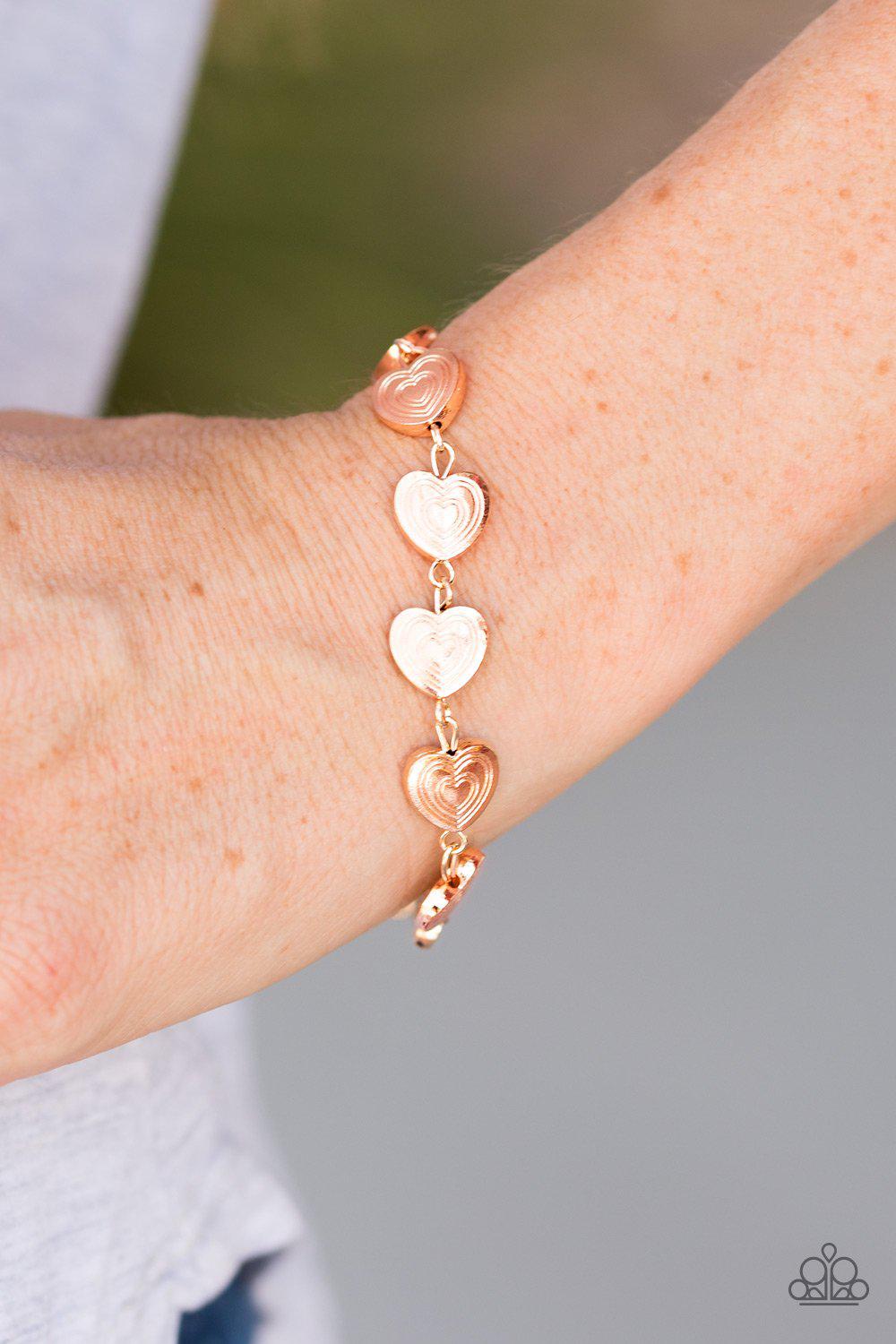 No Heart Feelings Gold Heart Bracelet - Paparazzi Accessories- on model - CarasShop.com - Paparazzi Jewelry by Cara Jewels
