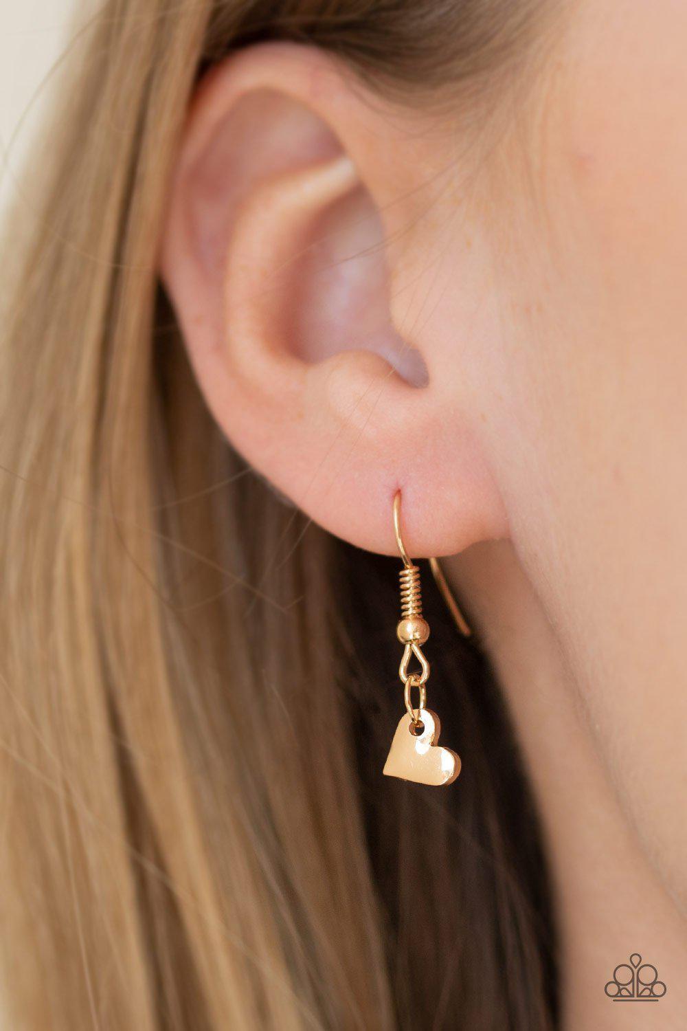 Not Your Damsel Gold Heart Necklace - Paparazzi Accessories- on model - CarasShop.com - Paparazzi Jewelry by Cara Jewels