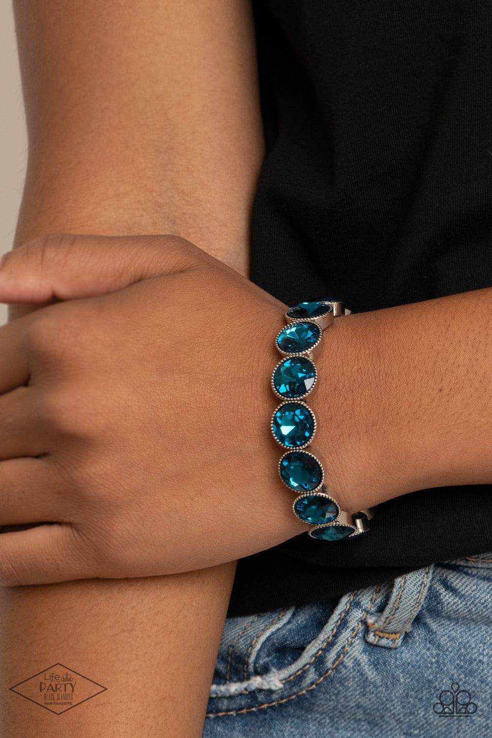 Number One Knockout Blue Rhinestone Bracelet - Paparazzi Accessories- on model - CarasShop.com - Paparazzi Jewelry by Cara Jewels