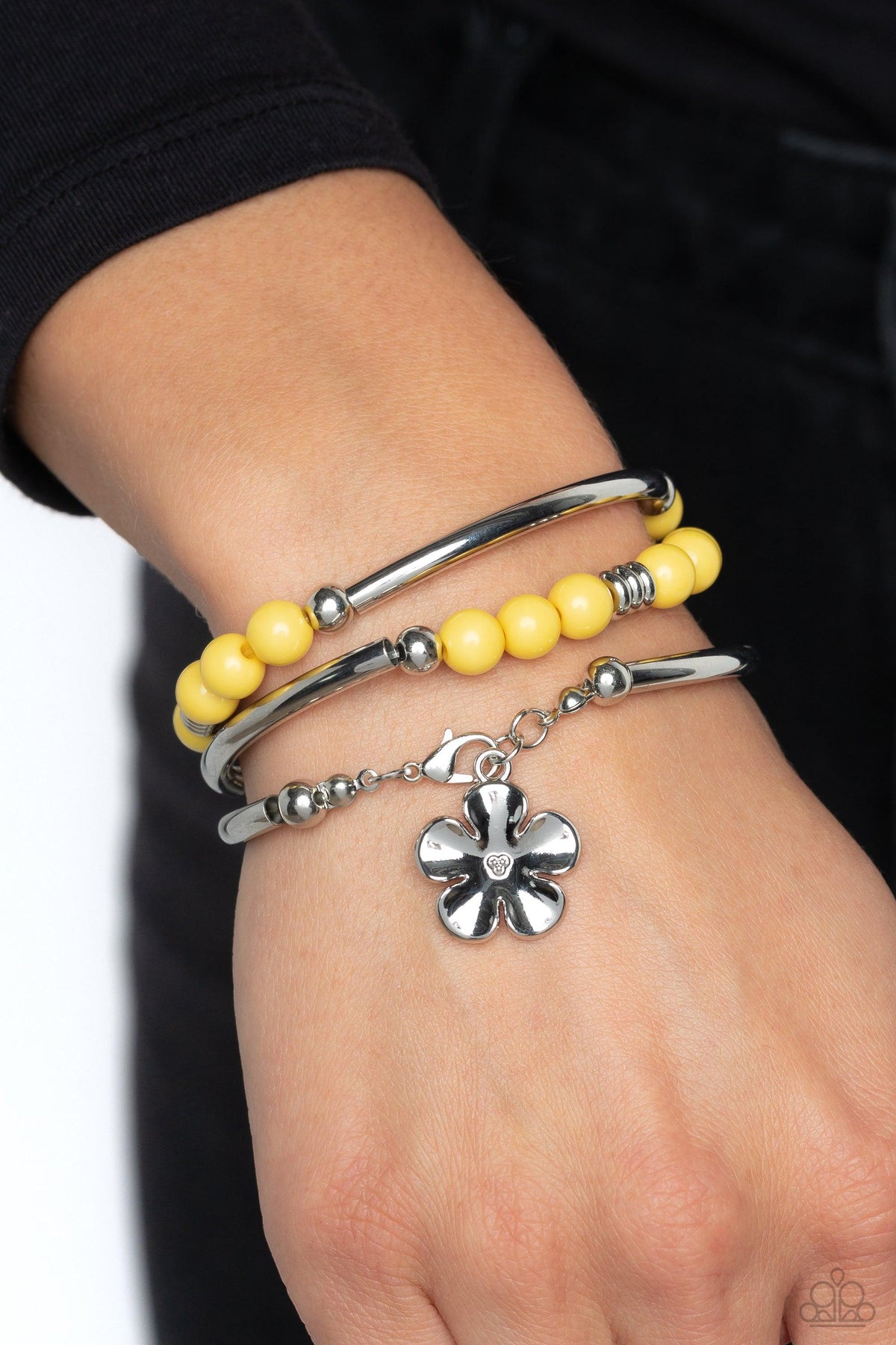 Off the WRAP Yellow Floral Coil Bracelet - Paparazzi Accessories- on model - CarasShop.com - Paparazzi Jewelry by Cara Jewels