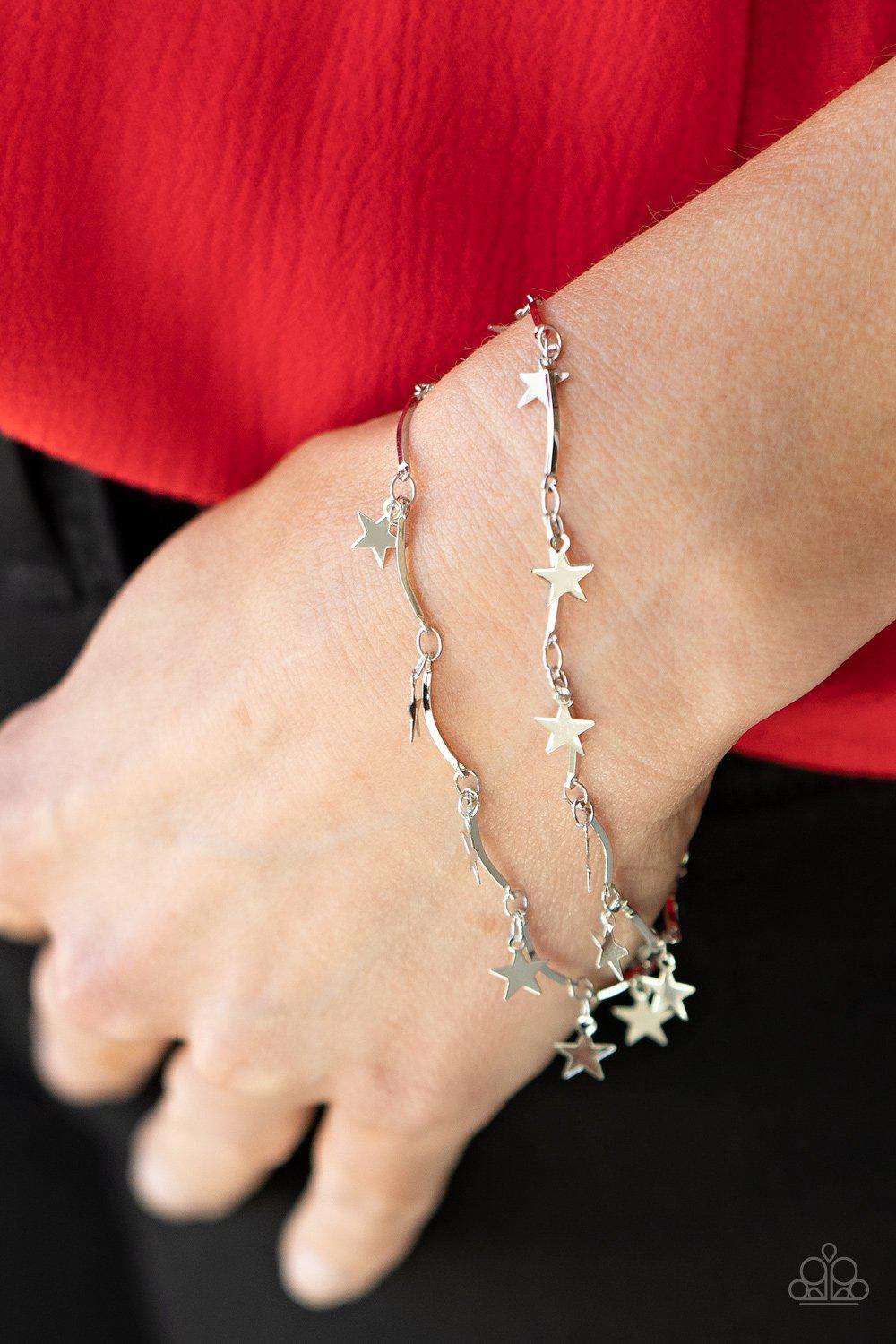 Party In The USA Silver Star Bracelet - Paparazzi Accessories- on model - CarasShop.com - Paparazzi Jewelry by Cara Jewels