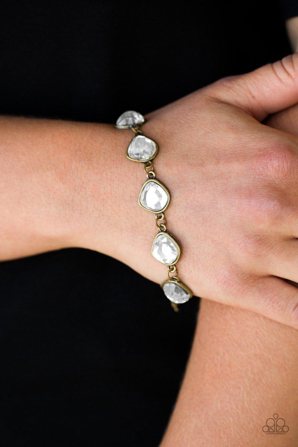 Perfect Imperfection Brass and White Rhinestone Bracelet - Paparazzi Accessories- on model - CarasShop.com - Paparazzi Jewelry by Cara Jewels