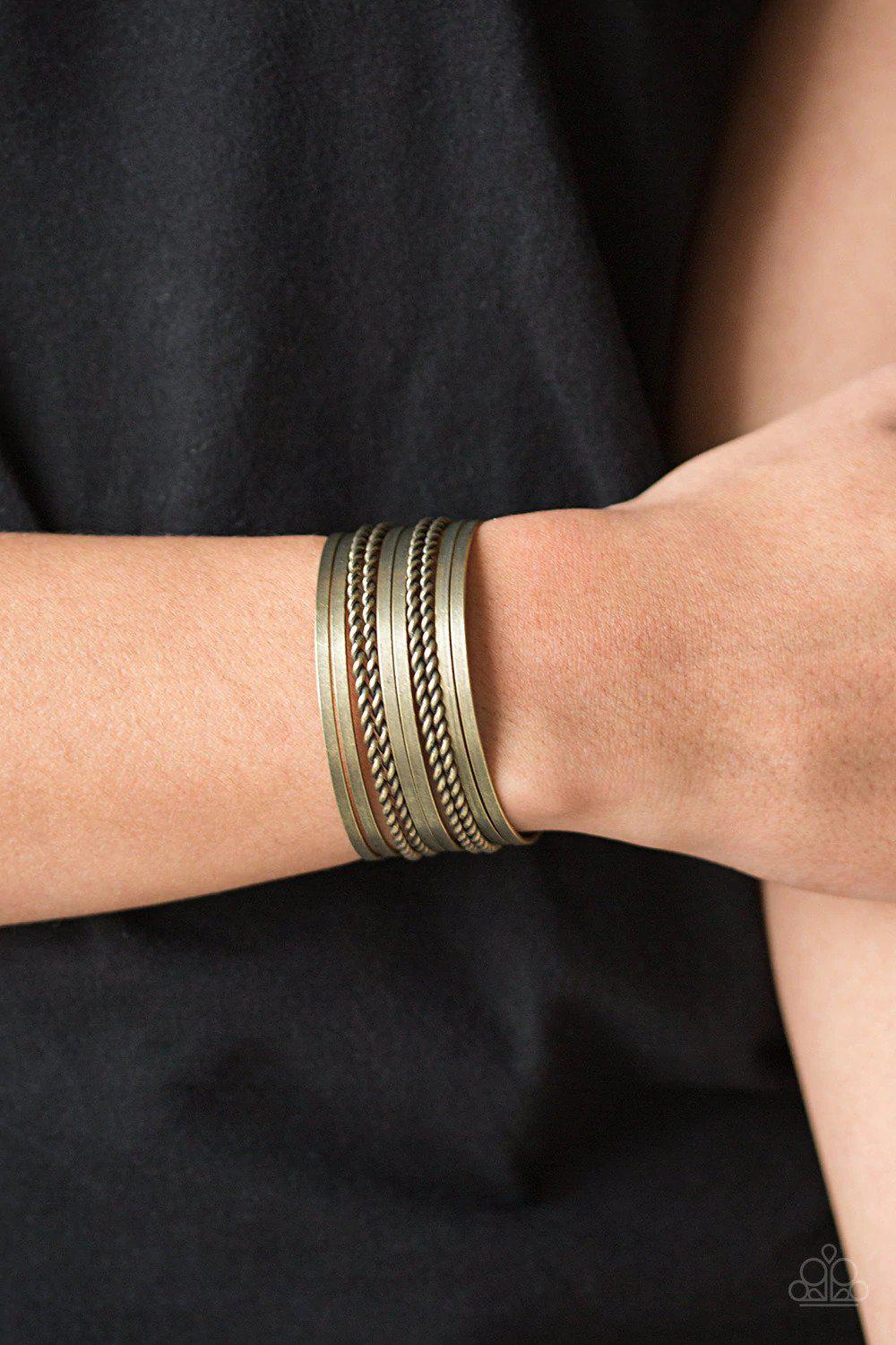 Perfectly Patterned Brass Cuff Bracelet - Paparazzi Accessories- on model - CarasShop.com - Paparazzi Jewelry by Cara Jewels