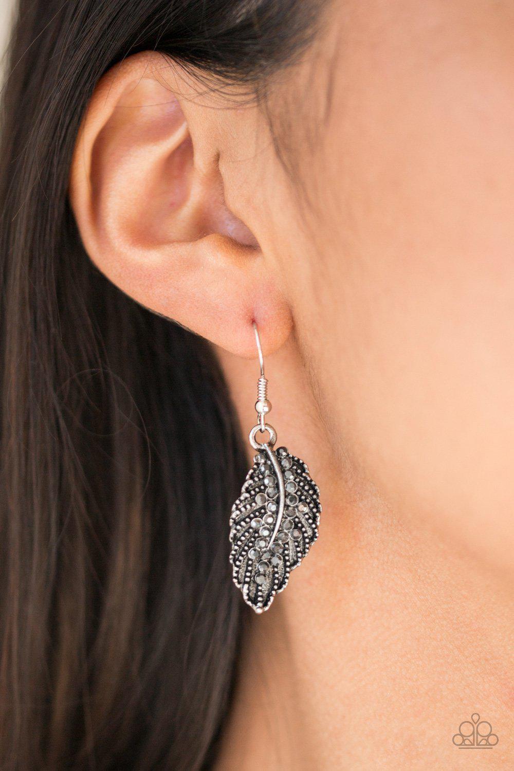 Pilot Quest Silver Feather Necklace and matching Earrings - Paparazzi Accessories- on model - CarasShop.com - Paparazzi Jewelry by Cara Jewels