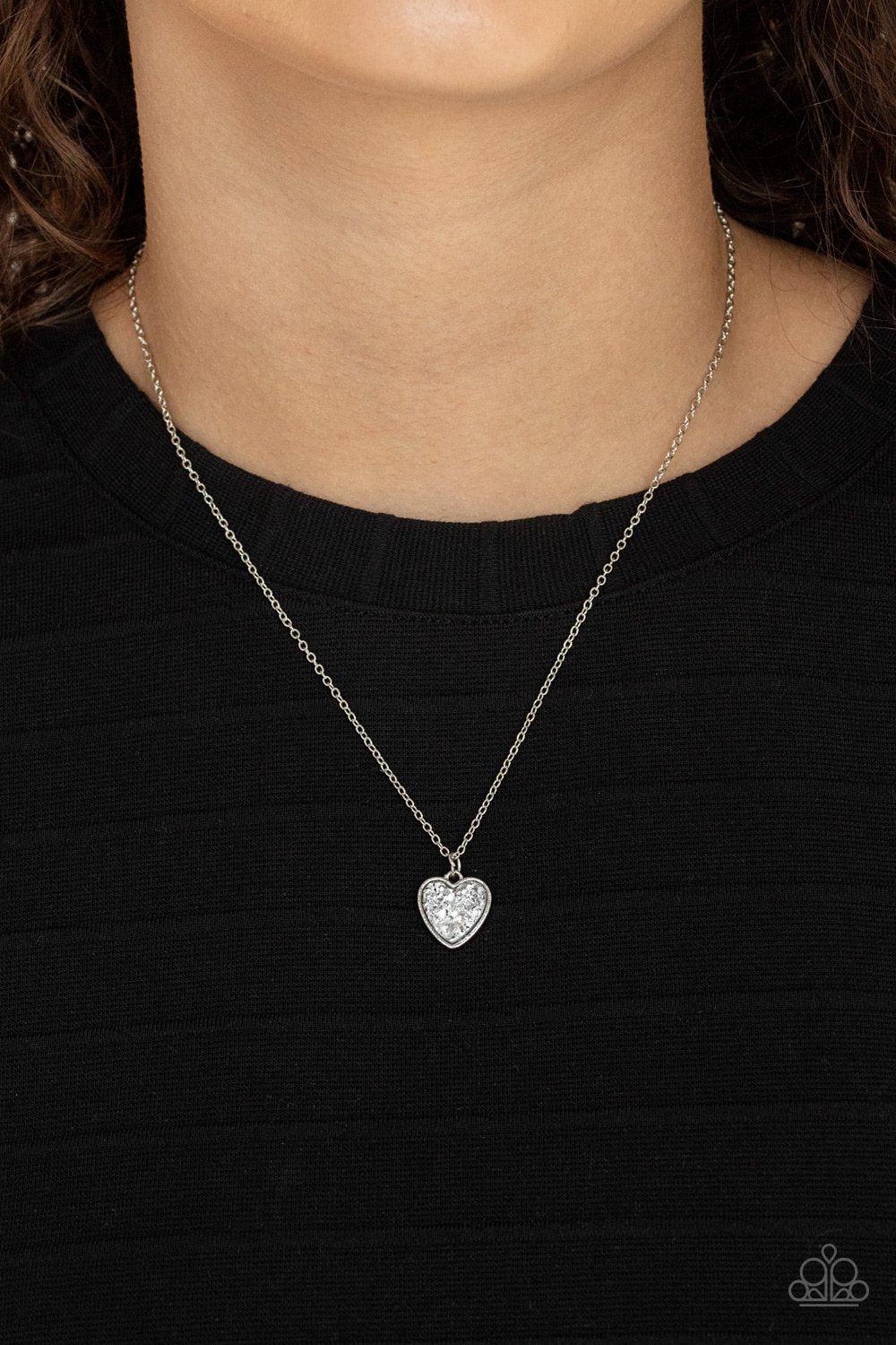 Pitter-Patter, Goes My Heart Silver Heart Necklace - Paparazzi Accessories- on model - CarasShop.com - Paparazzi Jewelry by Cara Jewels