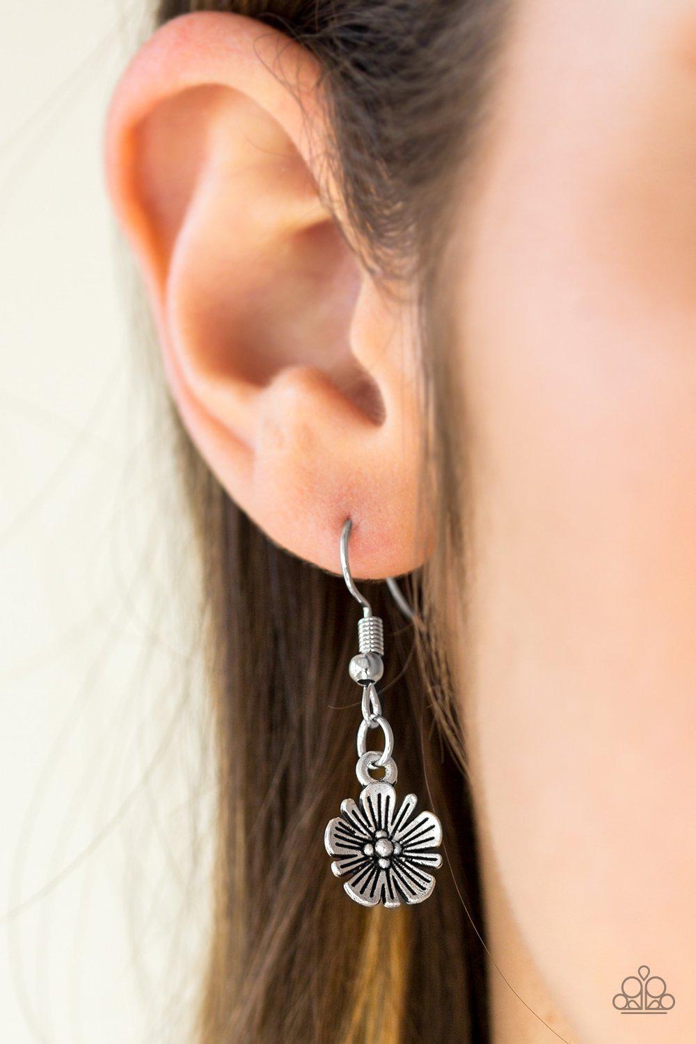 Poppin' Poppies Silver Flower Necklace - Paparazzi Accessories- on model - CarasShop.com - Paparazzi Jewelry by Cara Jewels