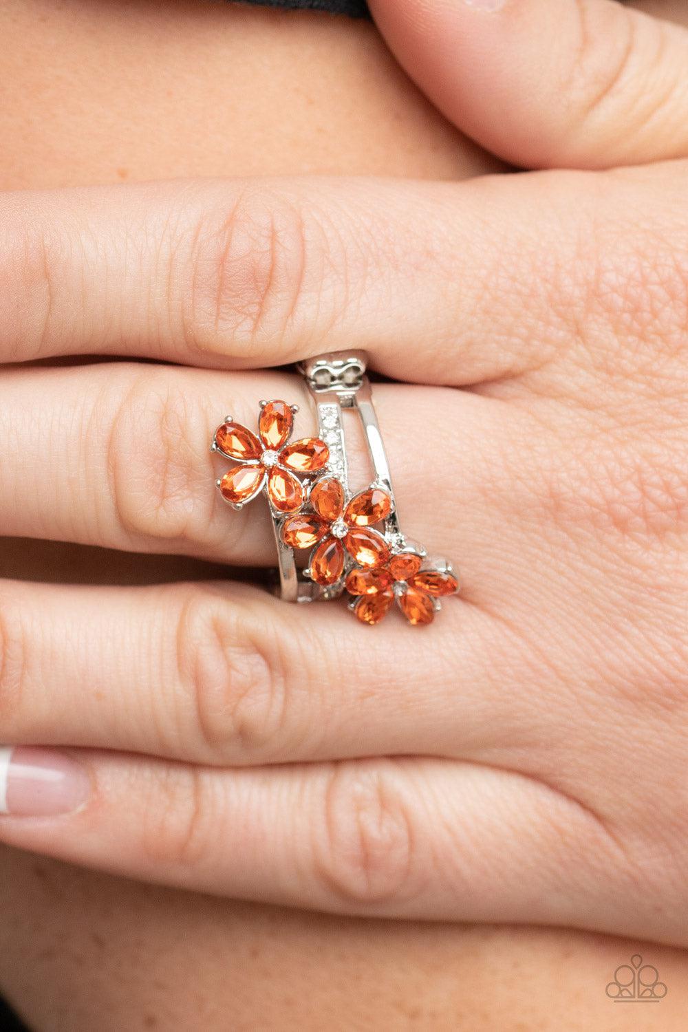 Posh Petals Orange Rhinestone Flower Ring - Paparazzi Accessories- on model - CarasShop.com - Paparazzi Jewelry by Cara Jewels