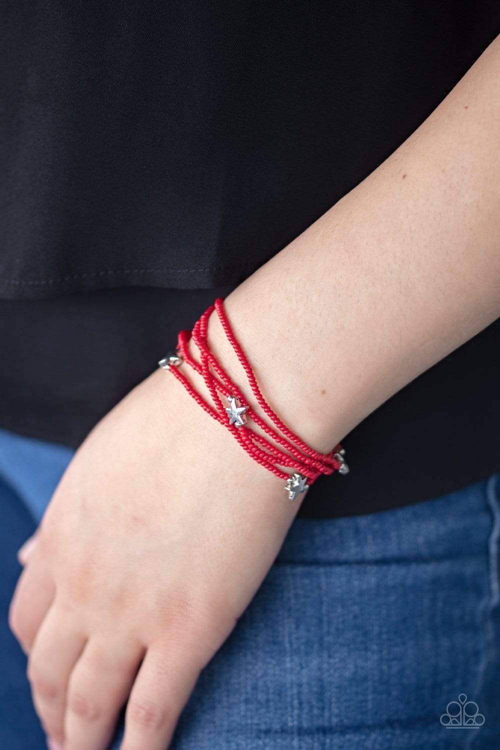 Pretty Patriotic Red Seed Bead and Silver Star Bracelet - Paparazzi Accessories- on model - CarasShop.com - Paparazzi Jewelry by Cara Jewels