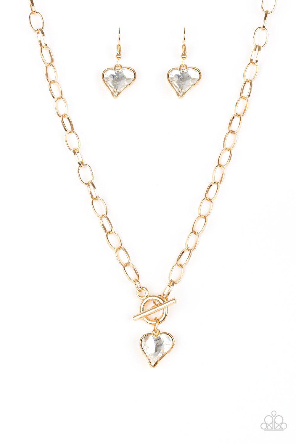 Princeton Princess Gold and White Rhinestone Heart Toggle Necklace - Paparazzi Accessories- lightbox - CarasShop.com - Paparazzi Jewelry by Cara Jewels