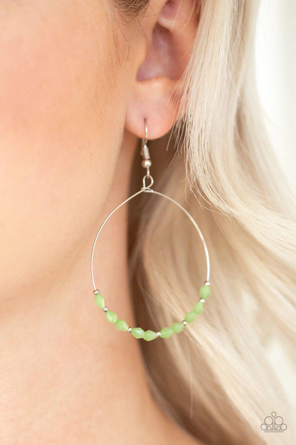 Prize Winning Sparkle Green Earrings - Paparazzi Accessories- on model - CarasShop.com - Paparazzi Jewelry by Cara Jewels