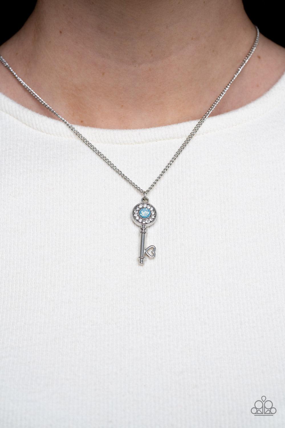 Prized Key Player Opal Blue Rhinestone Key Necklace - Paparazzi Accessories- on model - CarasShop.com - Paparazzi Jewelry by Cara Jewels