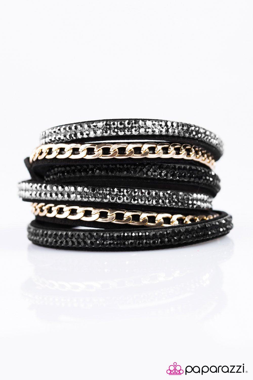 Put On Your Game Face Black and Gold Urban Double-wrap Snap Bracelet - Paparazzi Accessories- on model - CarasShop.com - Paparazzi Jewelry by Cara Jewels