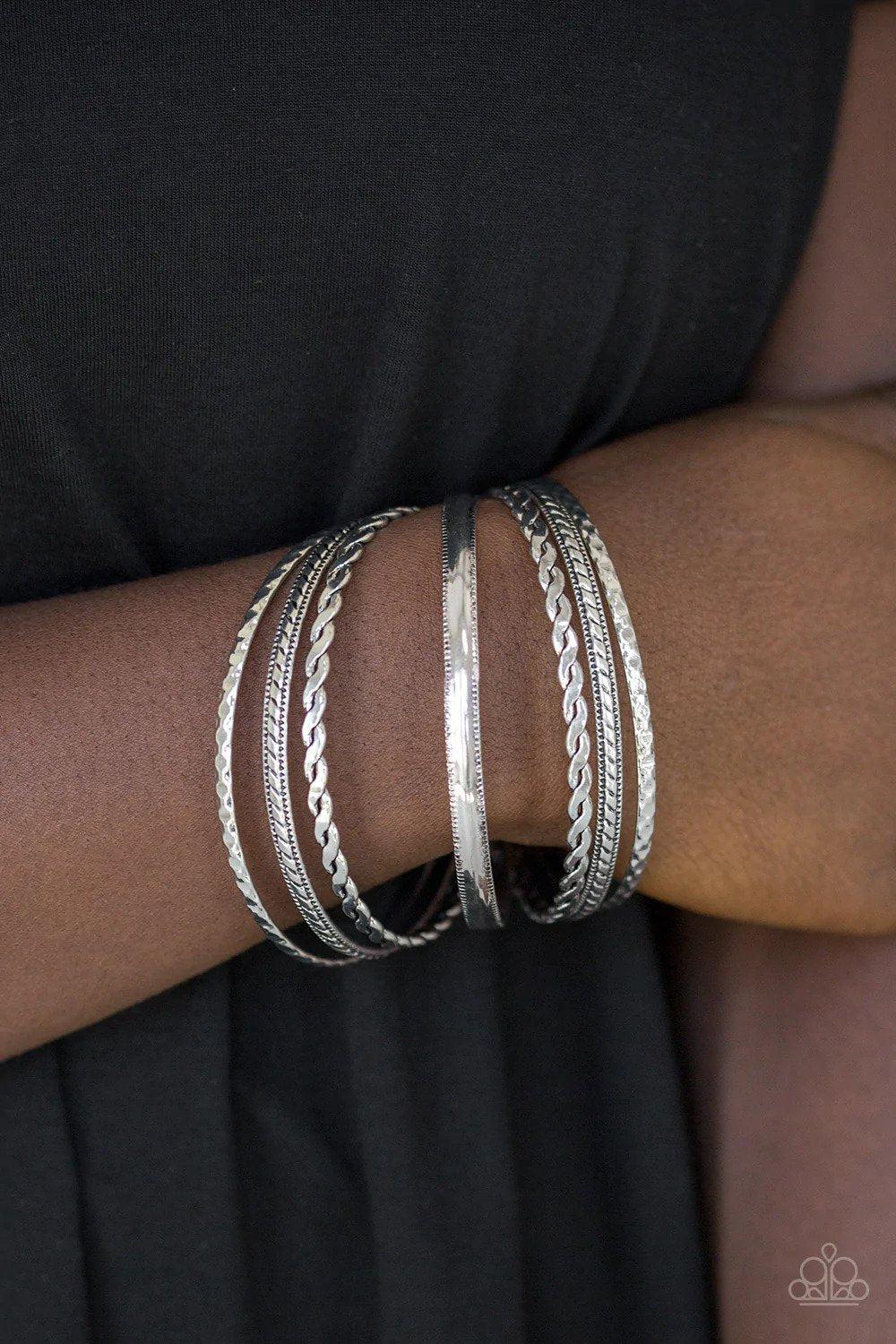 Rattle and Roll Silver Bracelet - Paparazzi Accessories- on model - CarasShop.com - Paparazzi Jewelry by Cara Jewels
