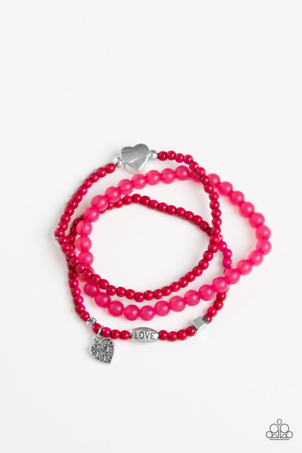 Really Romantic Hot Pink and Silver Heart Stretch Bracelet Set - Paparazzi Accessories- on model - CarasShop.com - Paparazzi Jewelry by Cara Jewels