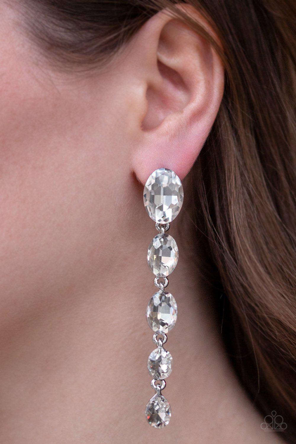 Red Carpet Radiance White Rhinestone Earrings - Paparazzi Accessories- on model - CarasShop.com - Paparazzi Jewelry by Cara Jewels
