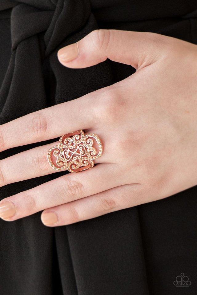 Regal Regalia Copper Rhinestone Ring - Paparazzi Accessories- on model - CarasShop.com - Paparazzi Jewelry by Cara Jewels