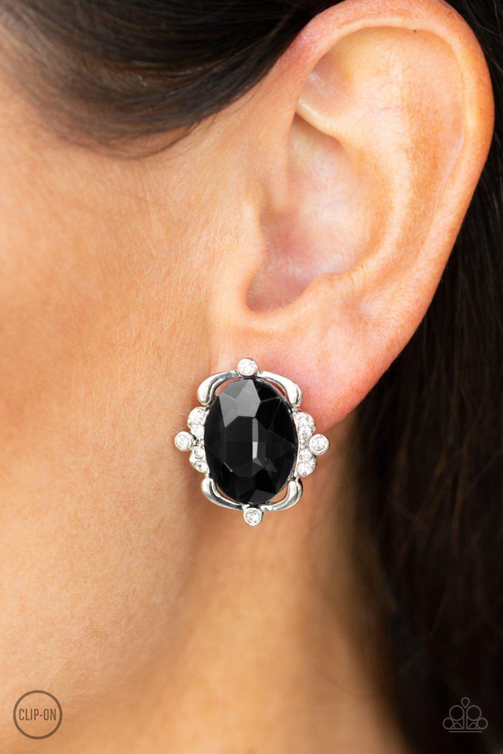 Regally Radiant Black Clip On Earrings - Paparazzi Accessories- on model - CarasShop.com - Paparazzi Jewelry by Cara Jewels