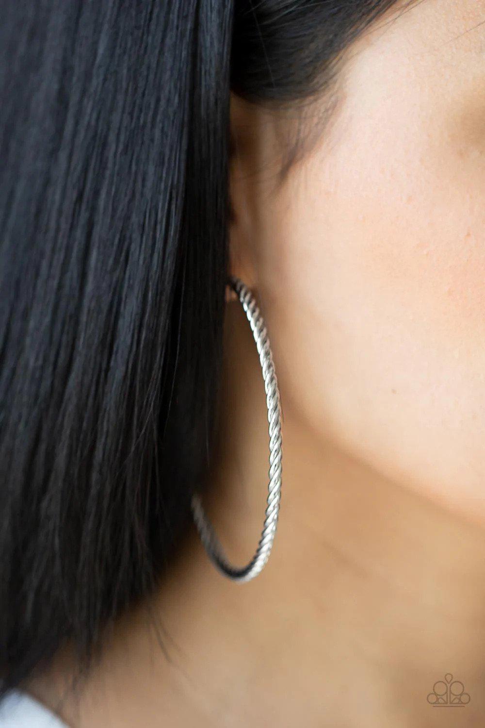 Resist The Twist Silver Earrings - Paparazzi Accessories- on model - CarasShop.com - Paparazzi Jewelry by Cara Jewels